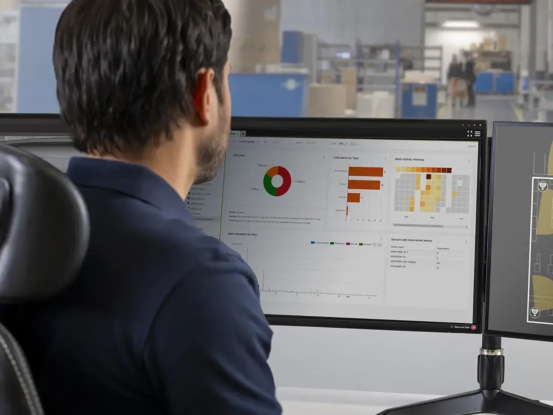 AXIS Image Health Analytics_man_watching_dashboard (1) copy
